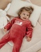 Baby pyjama van fuchsia velours met slakje
