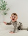 Baby pyjama van kaki velours met zebra
