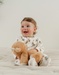 Babypyjama met wit fluwelen motief
