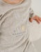 Baby pyjama van beige velours met konijntje
