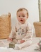 Beige velour pyjama with embroidered lion
