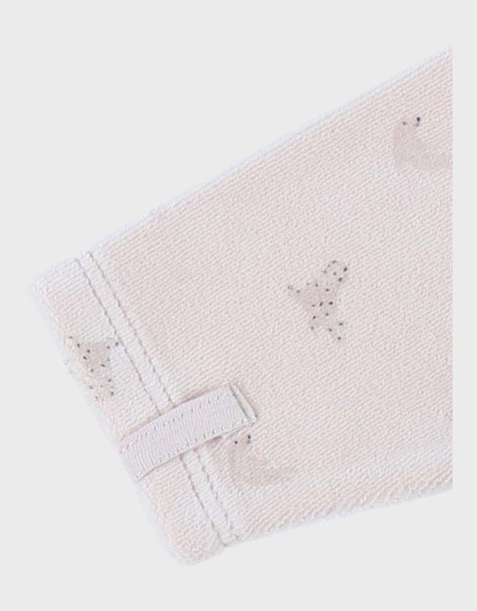 Ivory baby pyjama with seal print in velvet
