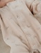 Ivory baby pyjama with seal print in velvet
