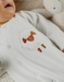 White baby pyjama with sheep embroidery in velvet
