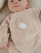 Ecru baby pyjama with seal embroidery in velvet
