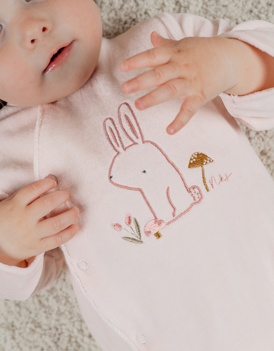 Pink velour baby pyjamas with bunny embroidery

