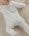 Velour baby pyjamas with cat embroidery
