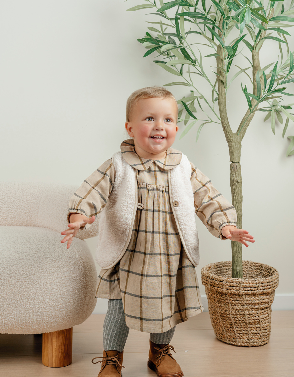 Taupe bodywarmer in sherpa
