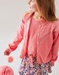 Roze vestje uit tricot met lurex