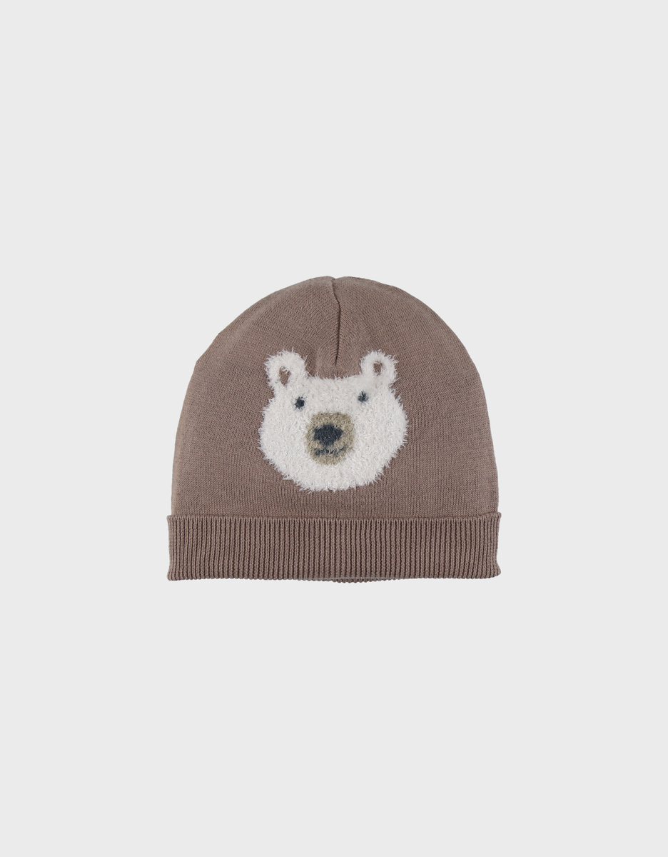 Brown knit hat with bear design
