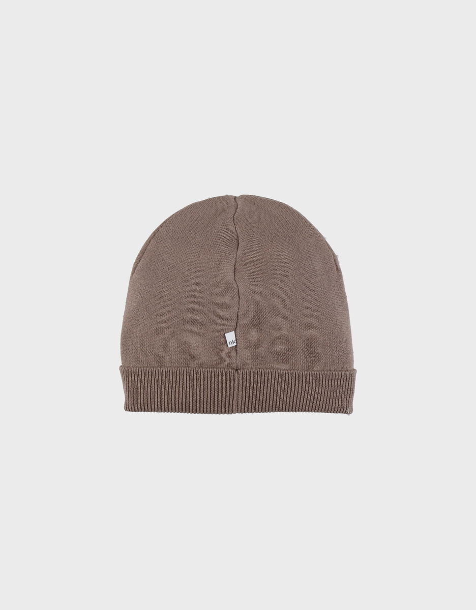Brown knit hat with bear design
