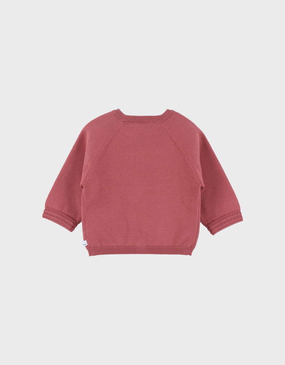 Gebreid vest in roze tint
