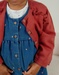 Gebreid vest in roze tint
