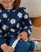 Knit cardigan with blue flowers
