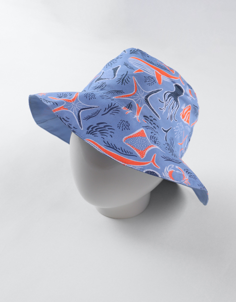 Omkeerbare hoed met prints, lichtblauw/oranje