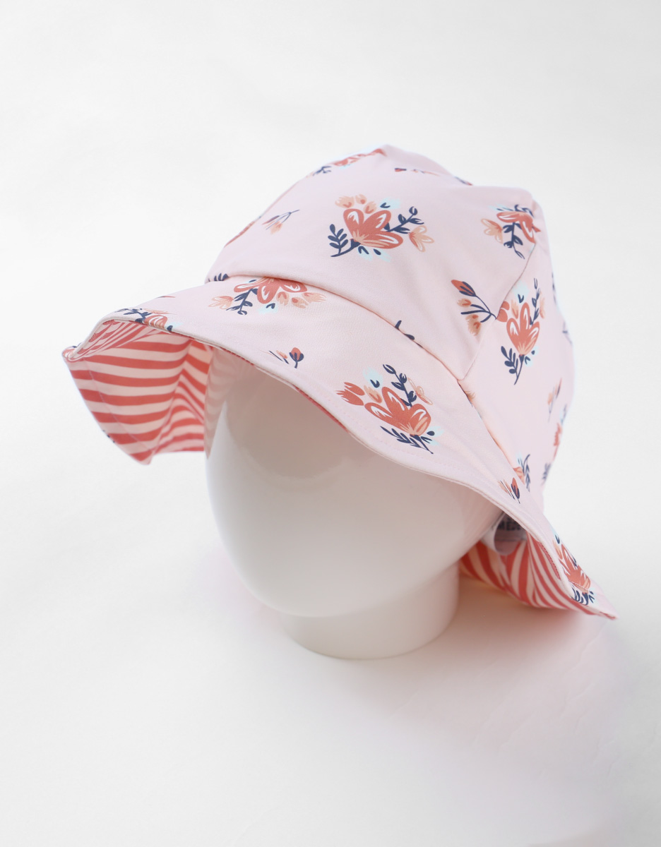 Reversible hat with floral prints, light pink/terracotta