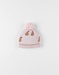 Light pink jersey hat with caramel-coloured pears