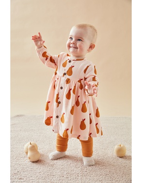 Pale pink dress and legging set with caramel-coloured pears