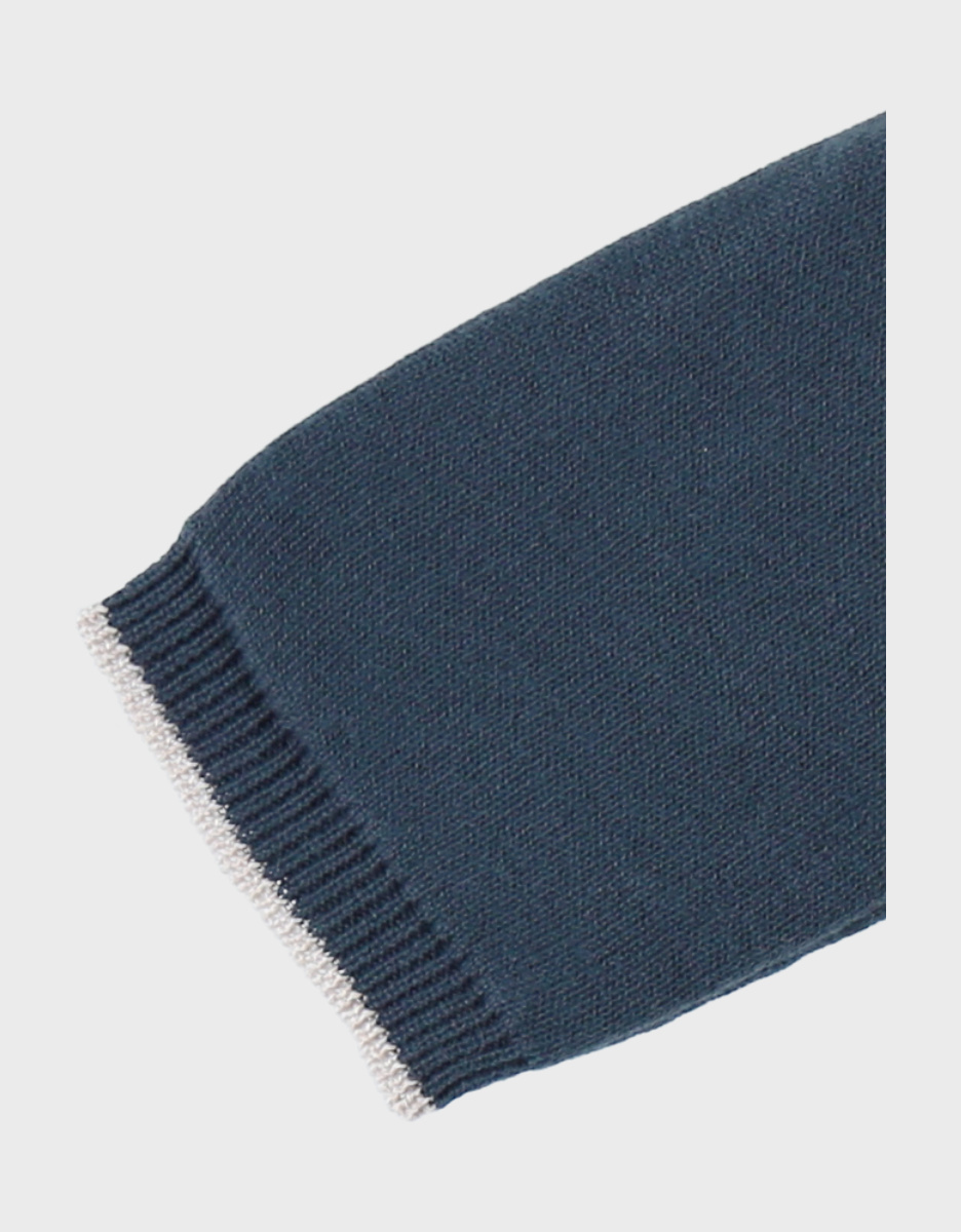 Blauwe babypyjama met gebreide tijger
