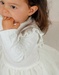 White two-material dress with knitted lurex
