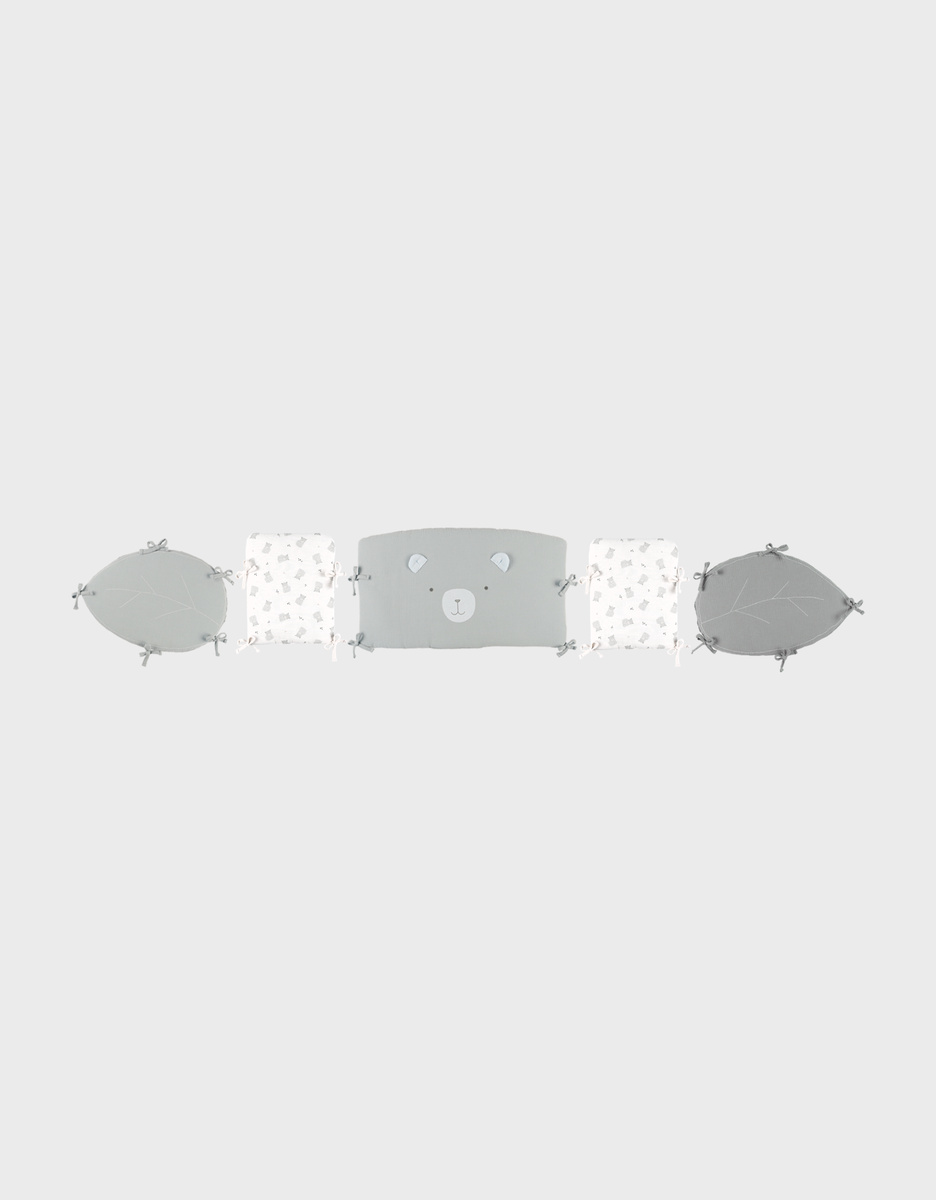Cot bumper and rail guards in embroidered muslin
