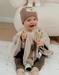 Lattekleurige poncho in Groloudoux®

