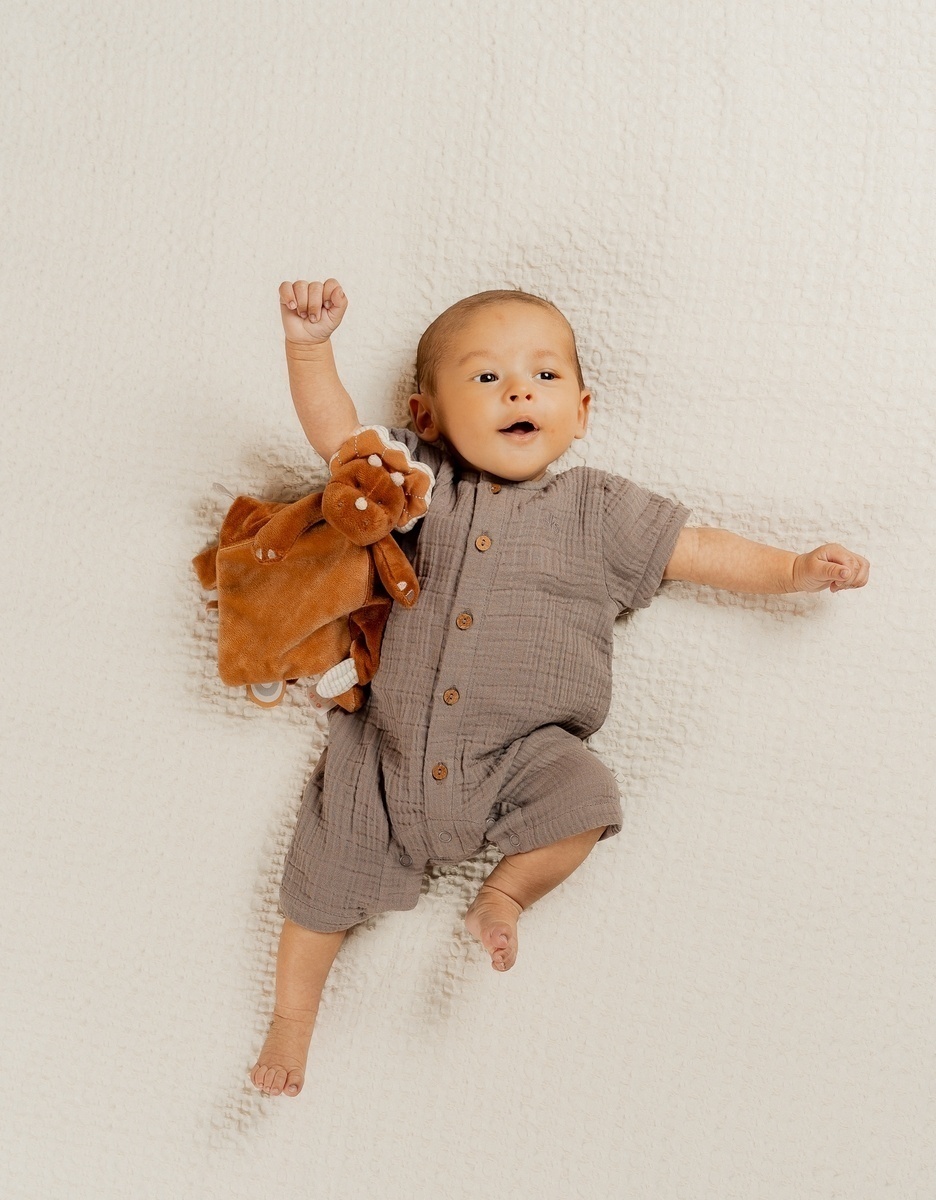 Baby romper and playsuit in soft brown cotton