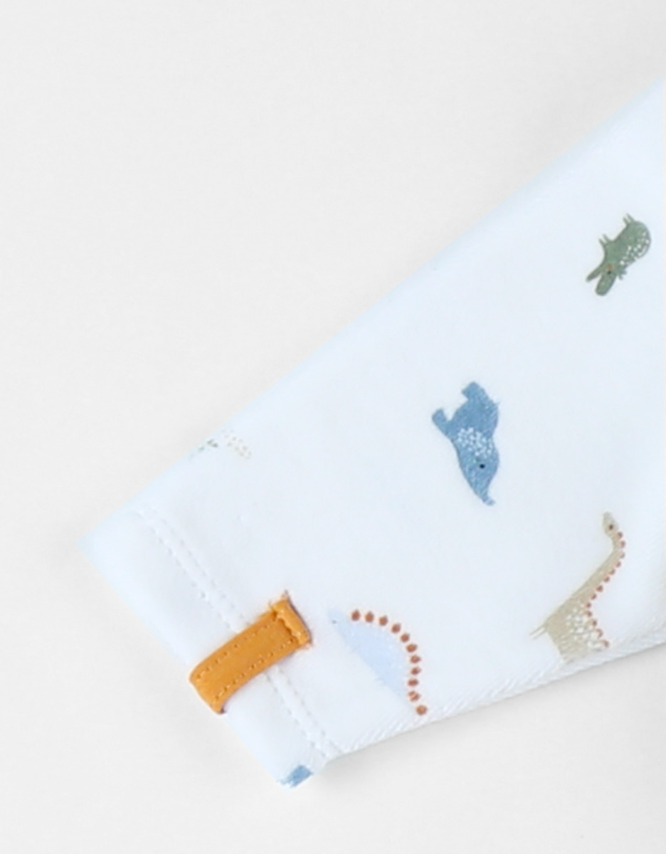 1-piece velvet pyjamas with dinosaursaursaur print, off-white