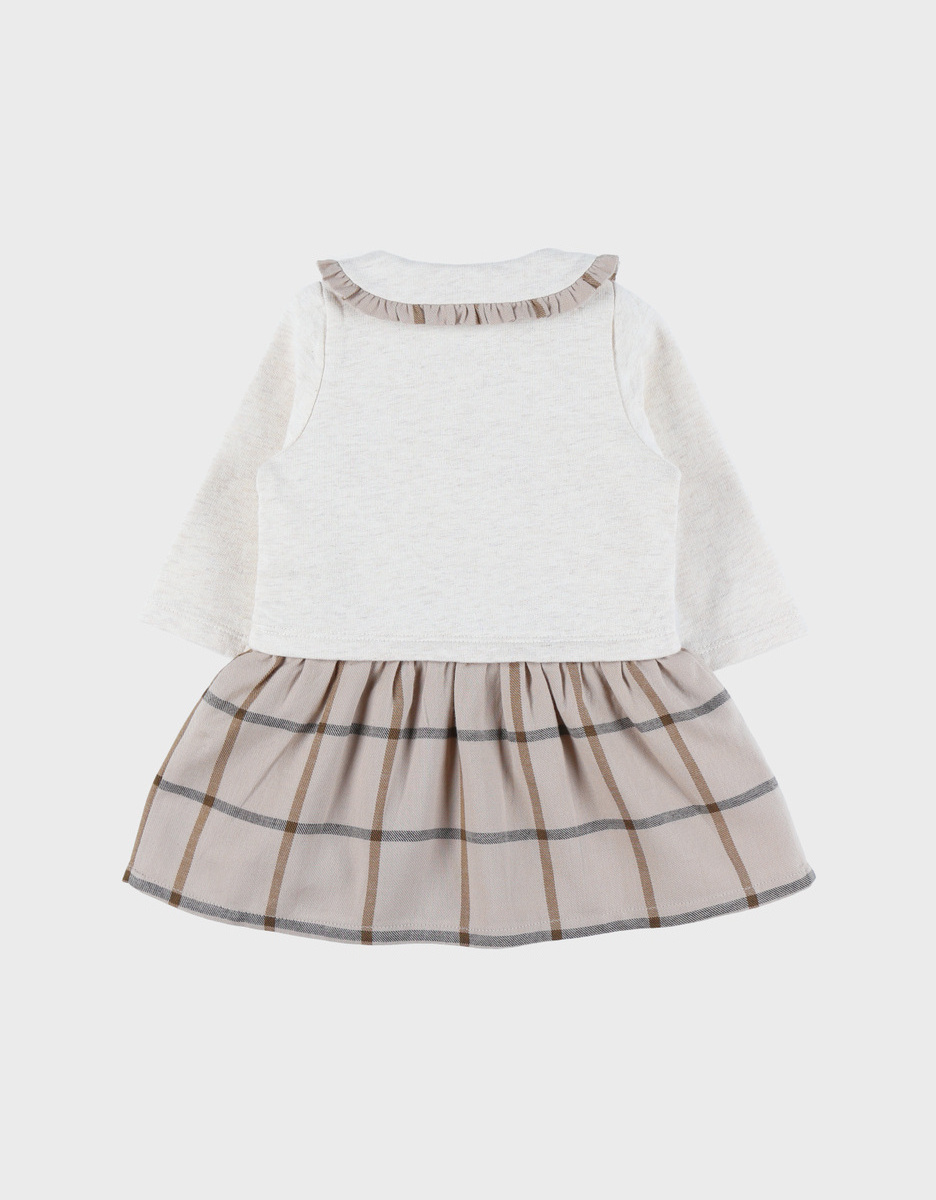 Tweekleurige babyjurk met beige ruitjes
