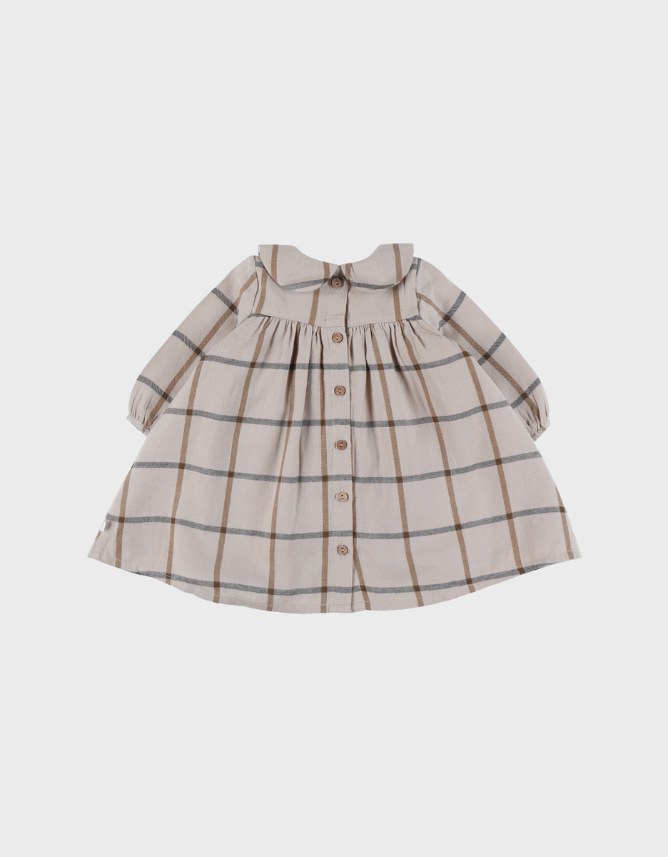 Babyjurk met beige ruitjes
