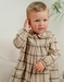 Babyjurk met beige ruitjes
