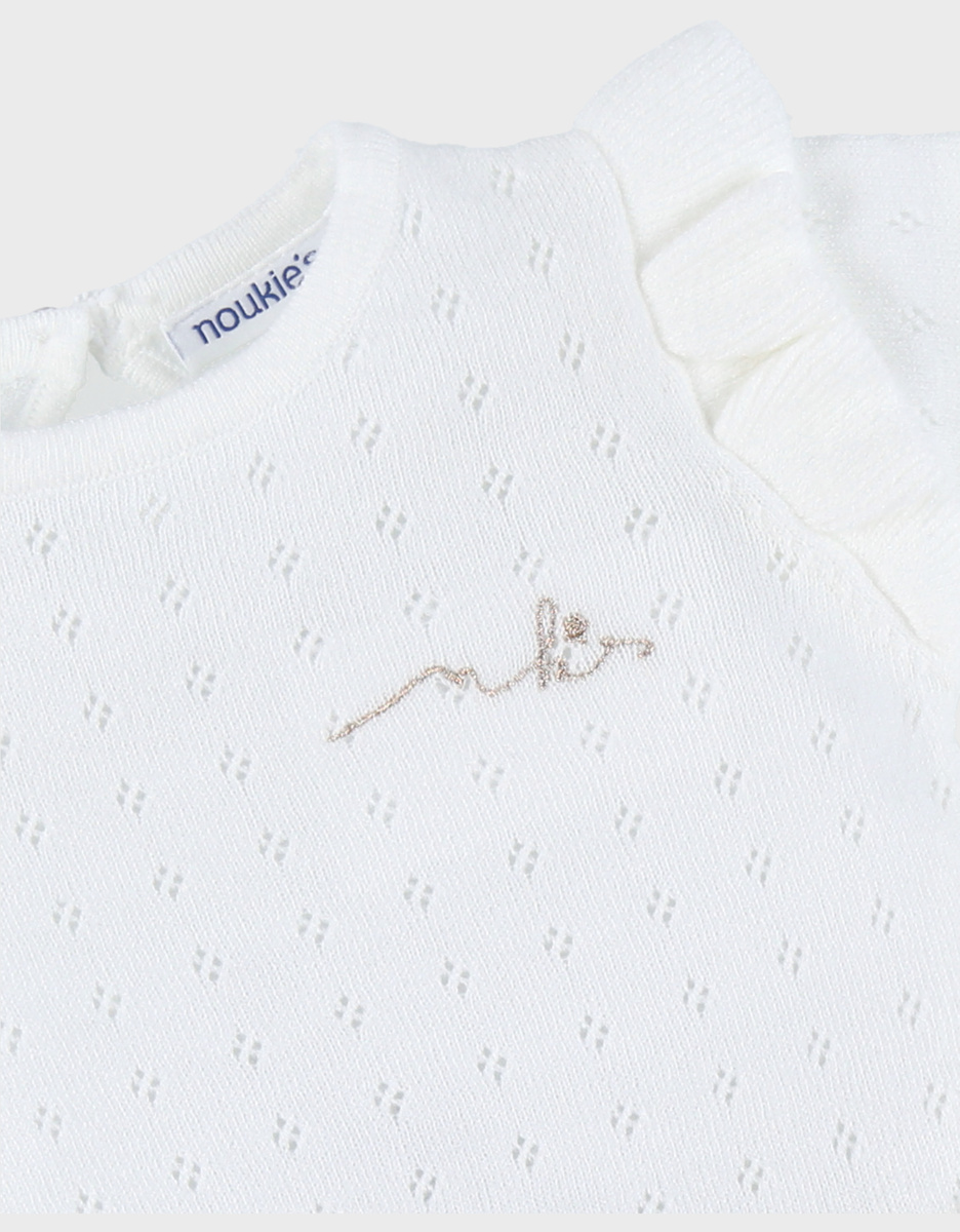Witte jurk in twee materialen met gebreid lurex
