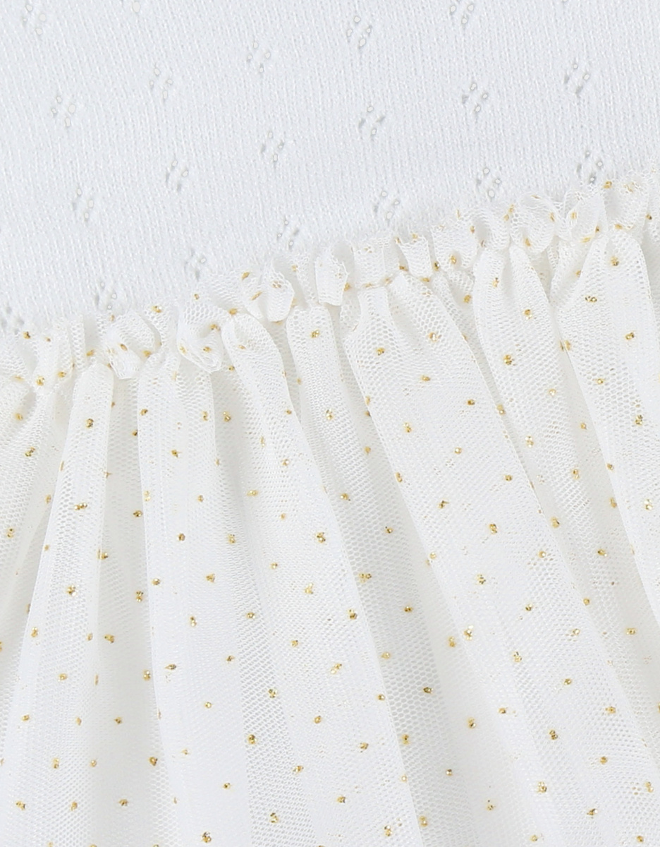 Witte jurk in twee materialen met gebreid lurex

