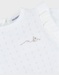 Witte jurk in twee materialen met gebreid lurex
