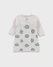 Light beige knit dress with floral pattern
