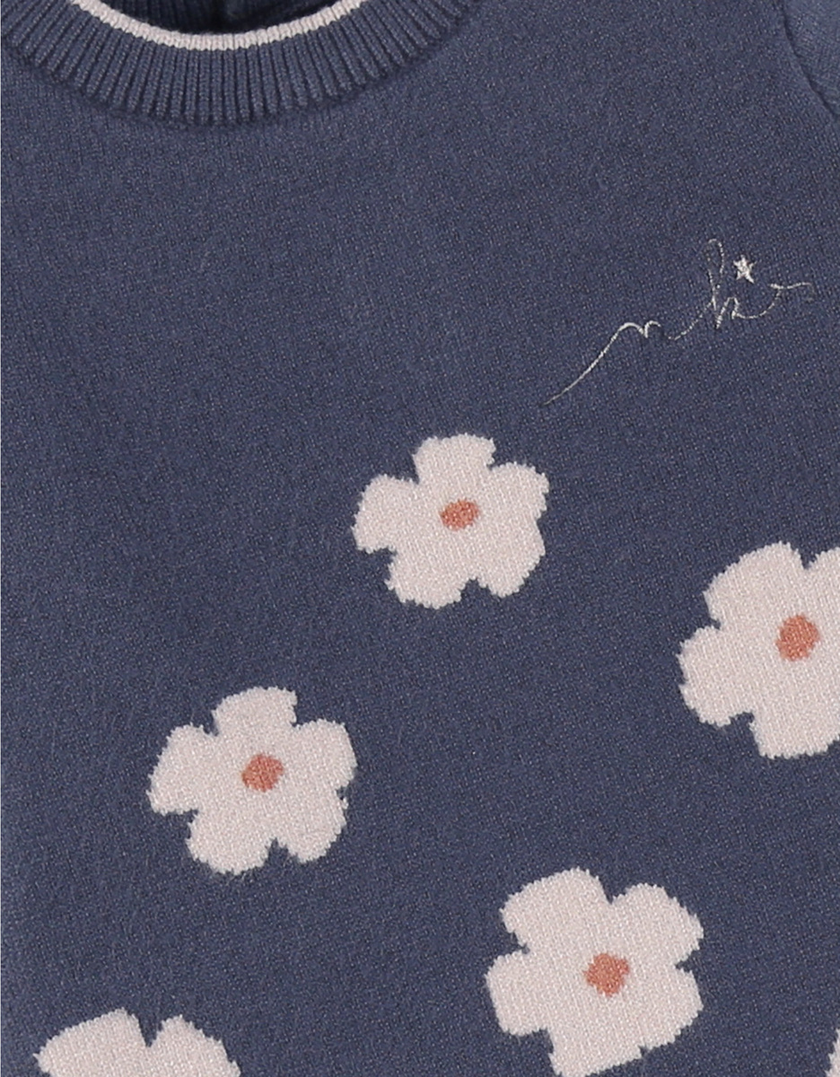 Blue knit dress with floral knit pattern

