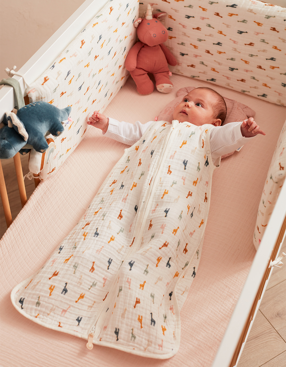 70 cm organic muslin sleeping bag with giraffe print, off-white