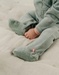 Groene babypyjama met olifantenborduursel in geribd fluweel
