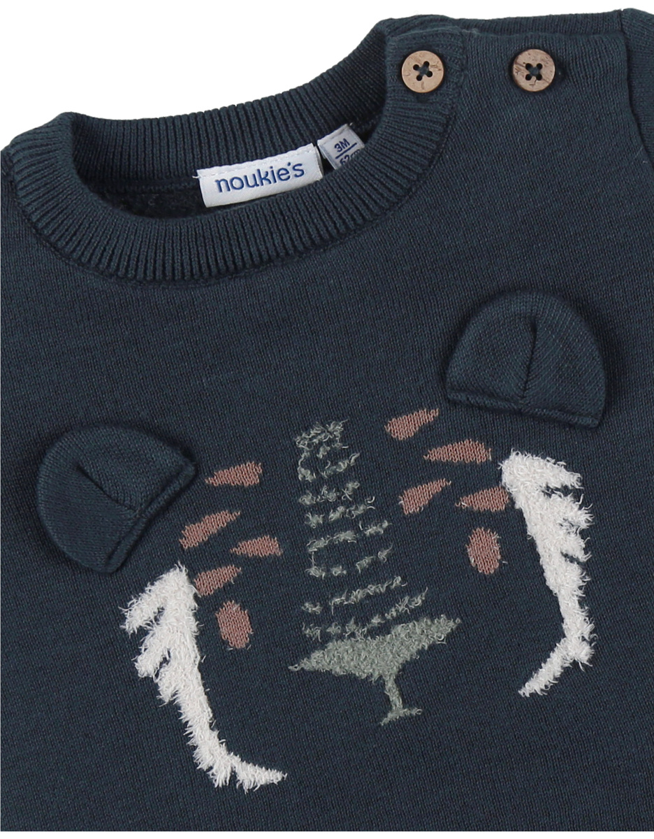 Blue knit sweater with tiger pattern
