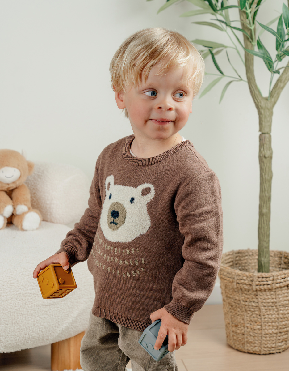 Brown knit sweater with bear pattern

