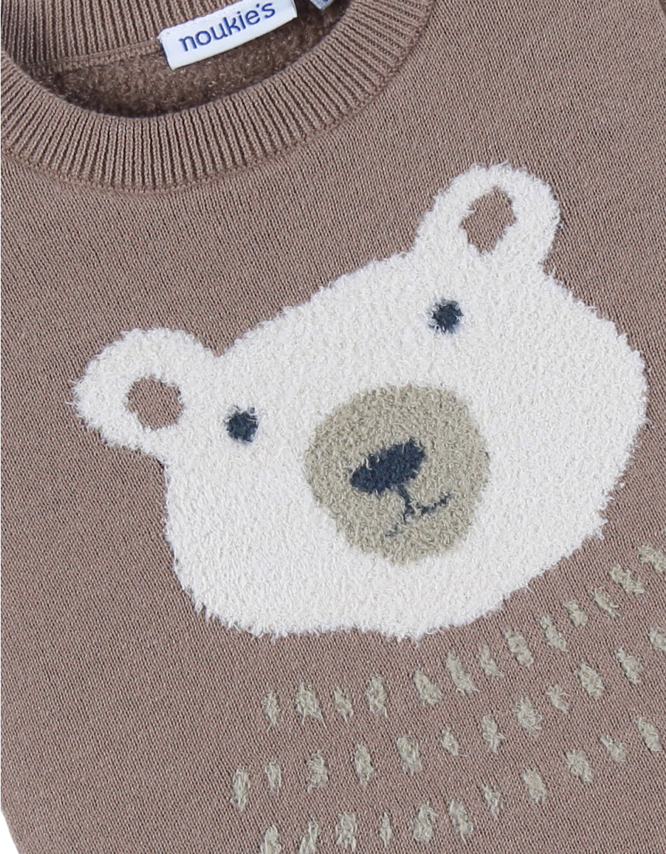 Brown knit sweater with bear pattern
