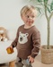 Brown knit sweater with bear pattern
