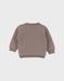 Brown knit sweater with bear pattern
