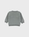 Pull en tricot vert avec motif tigre