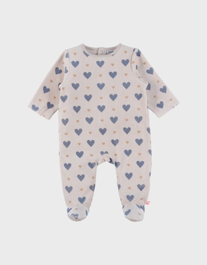Baby pyjama van beige velours met hartjesprint
