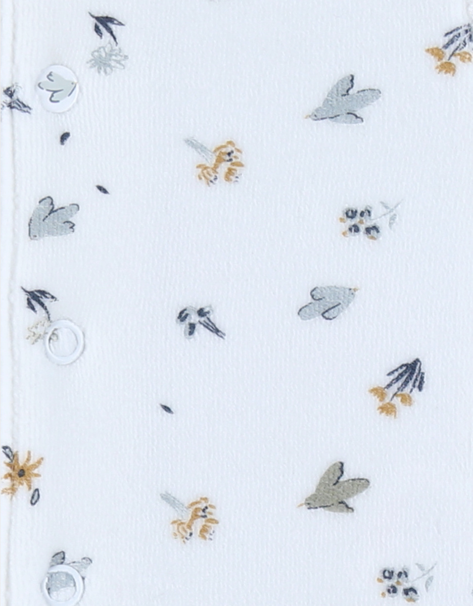 Witte velours baby pyjama met vogelprint
