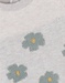 Robe en tricot beige clair avec motif floral