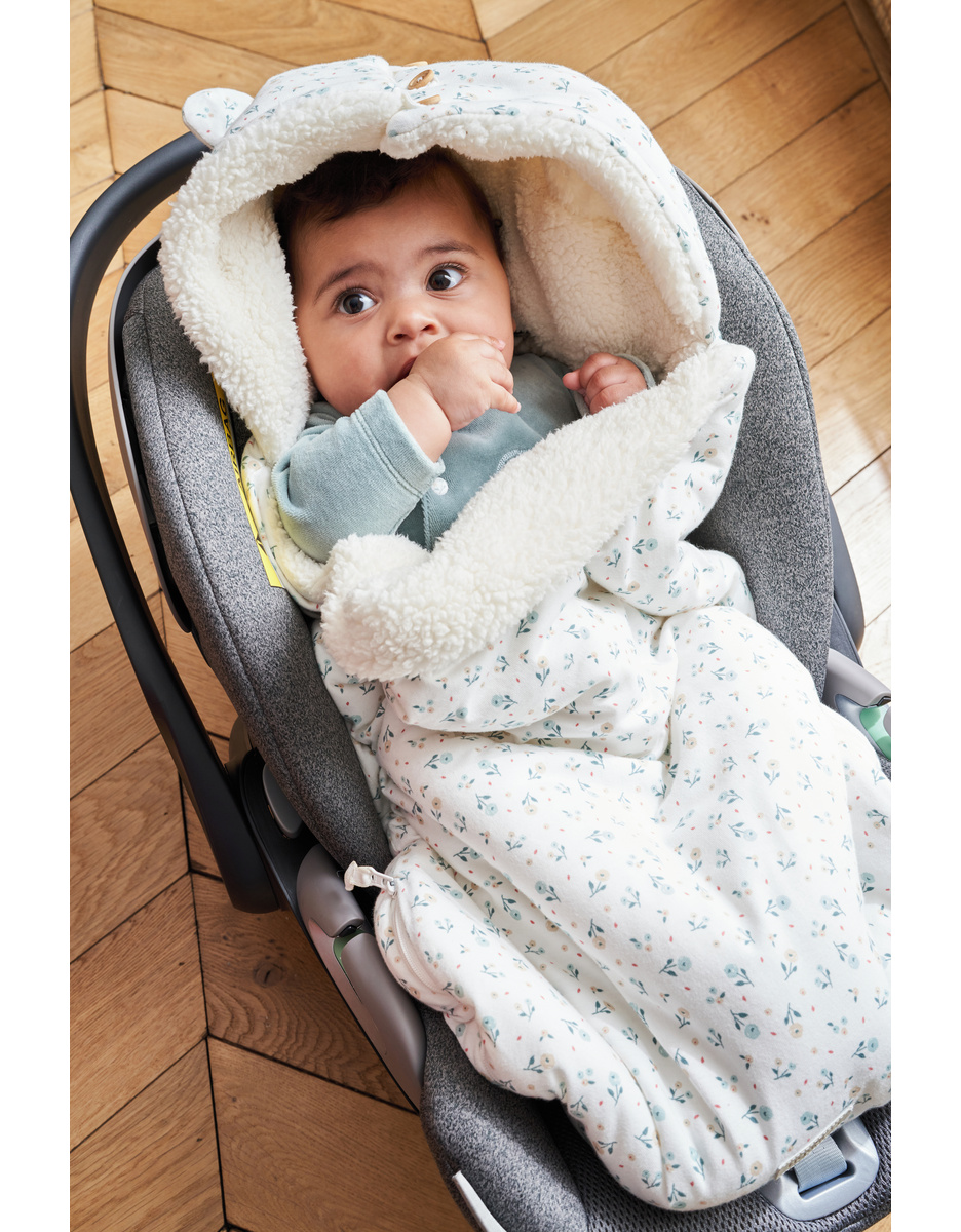 Babynest in jersey met een sherpa voering