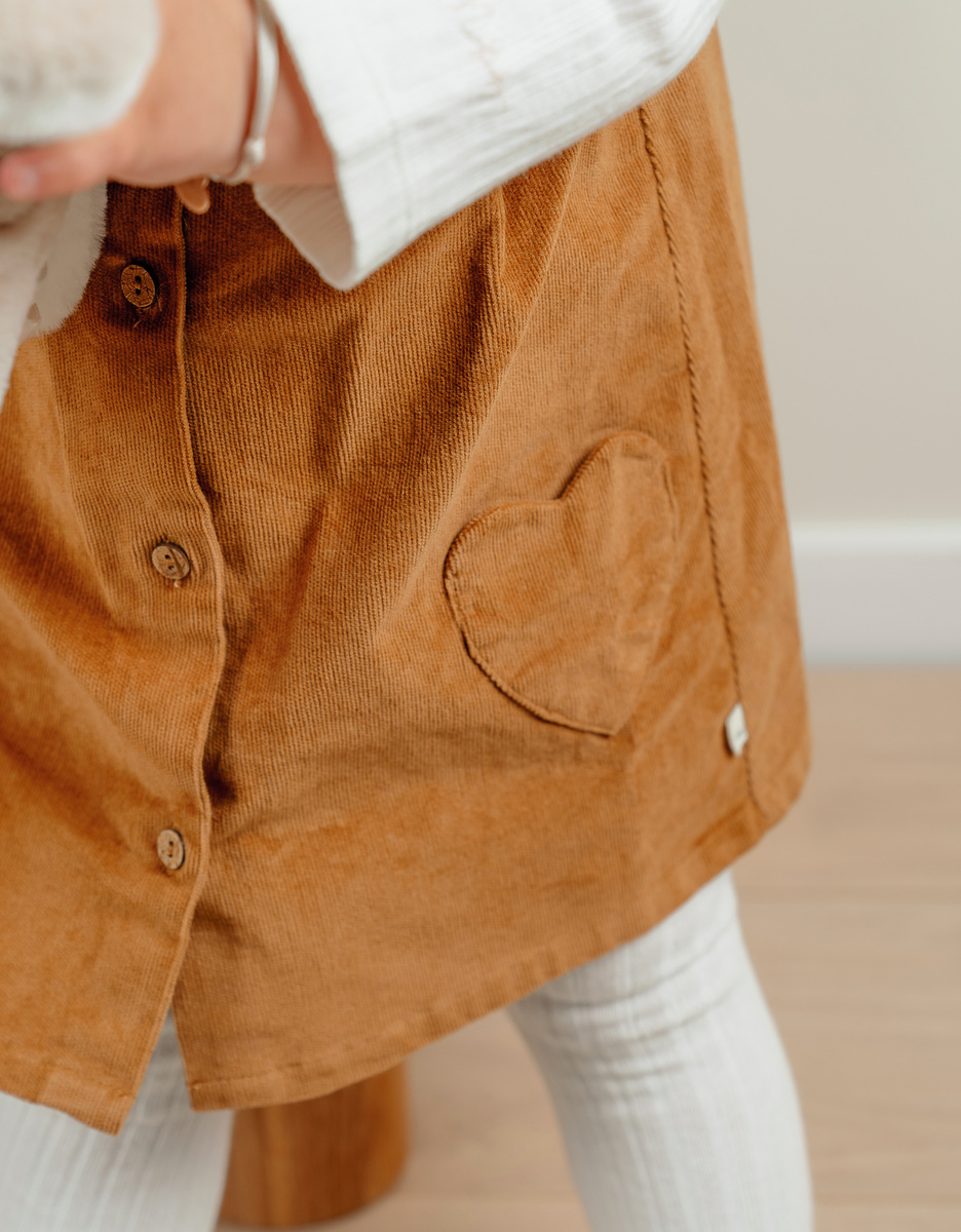 Brown denim dungarees and white T-shirt set
