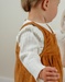 Brown denim dungarees and white T-shirt set
